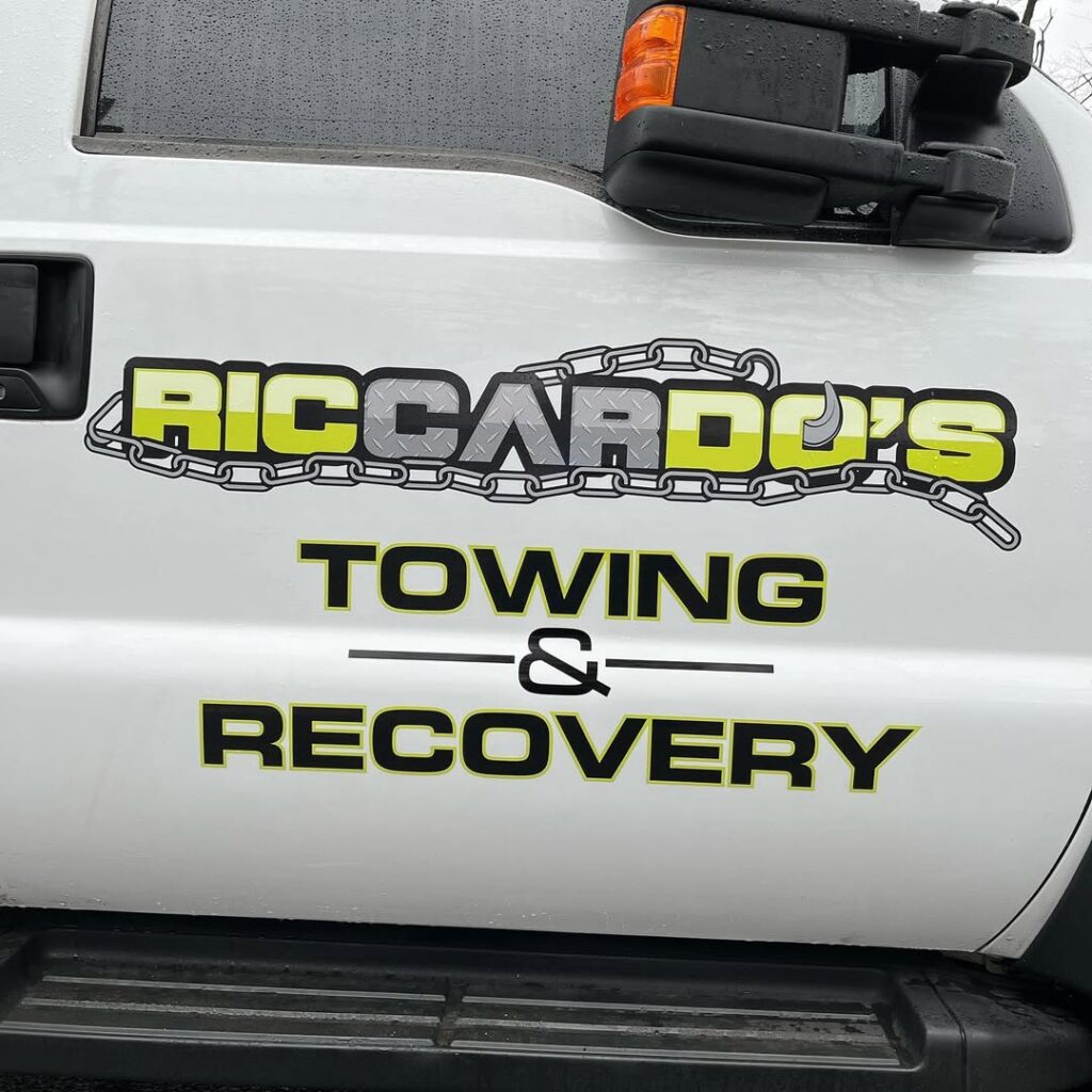 Towing and recovery service vehicle logo